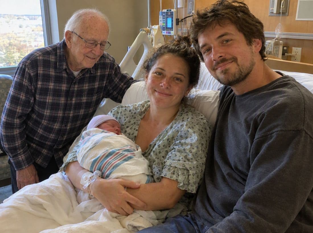 The new family photo with grandpa added beside them